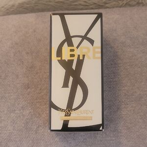Yves Saint Laurent Libre in Black, White, and Gold